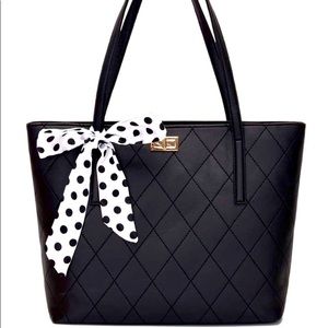 Black quilted tote bag